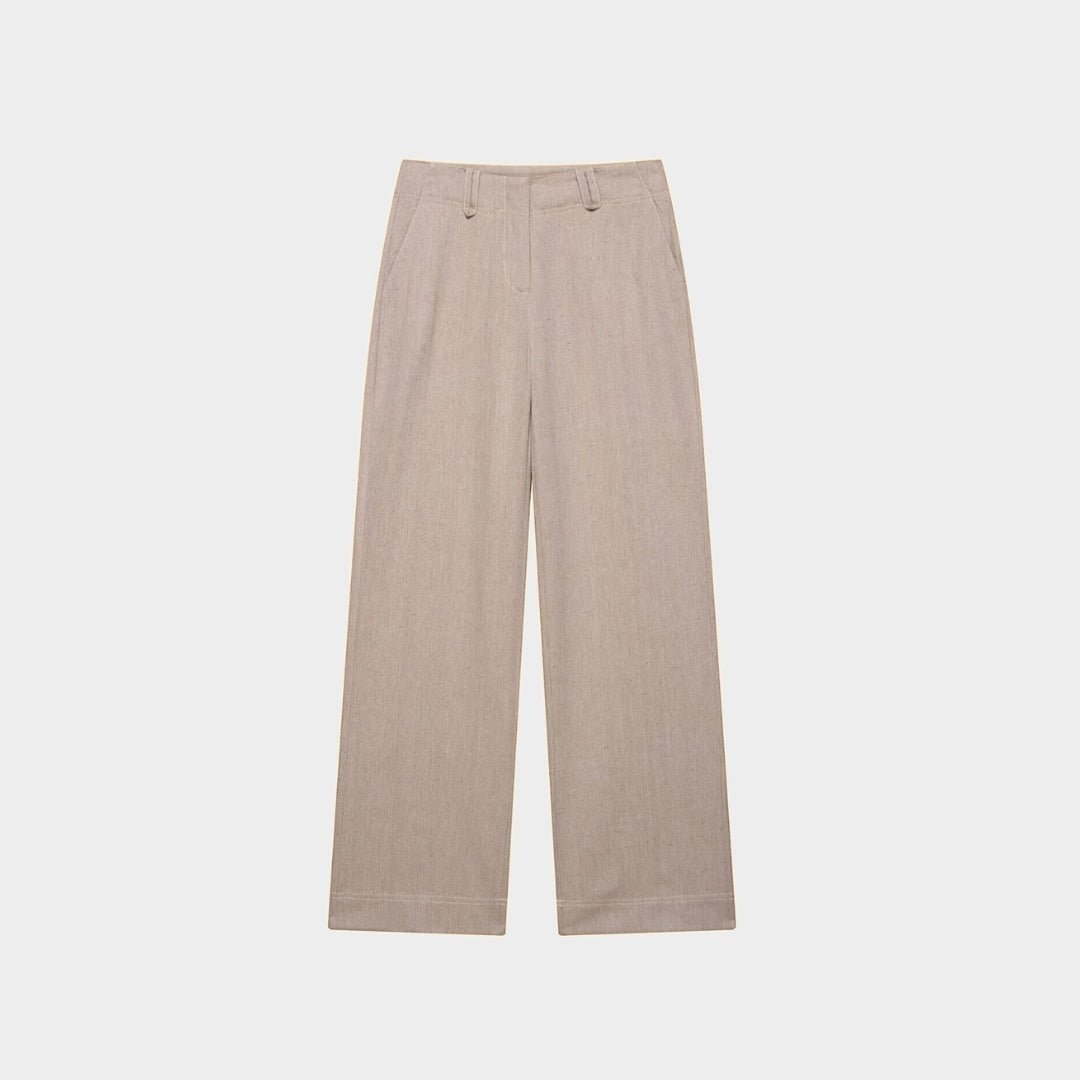 Beige tvådelat set med kort jacka och raka byxor i hög midja