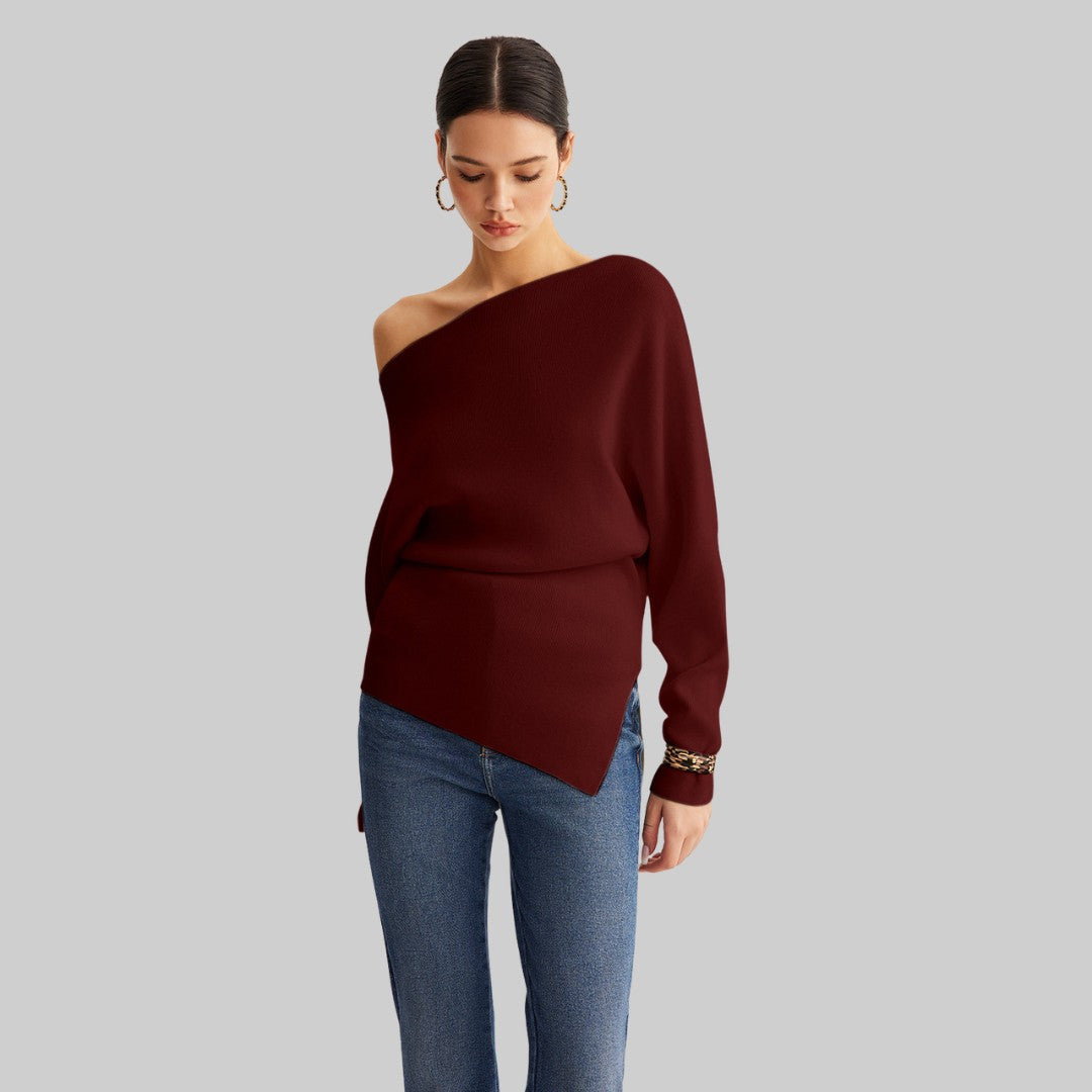 Asymmetrisk stickad topp med off-shoulder design och elegant drapering