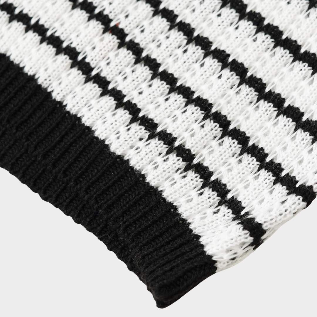 Vintageinspirerad stickad kofta med smala axelband och knappar