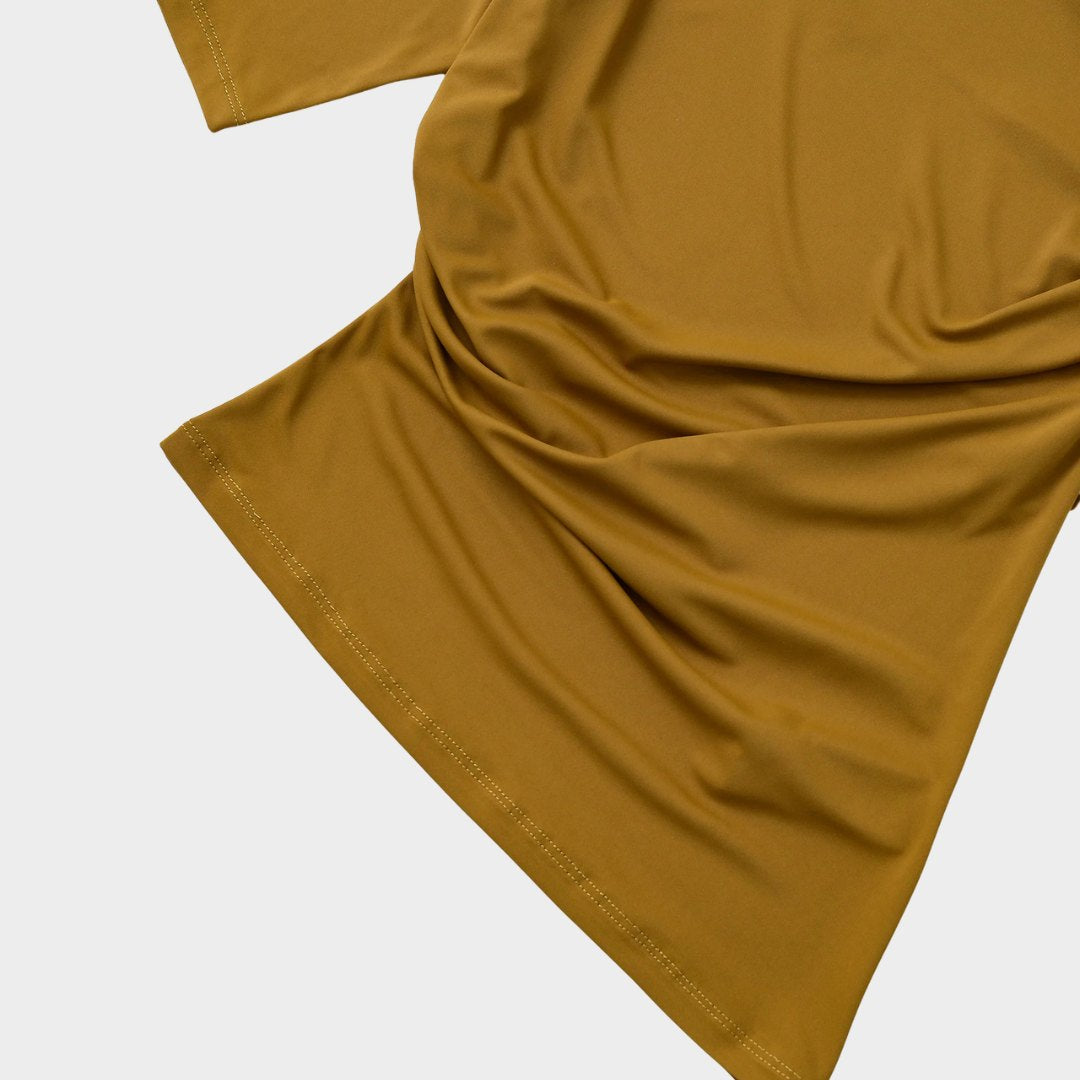 Stickad väst med ränder och asymmetrisk fåll