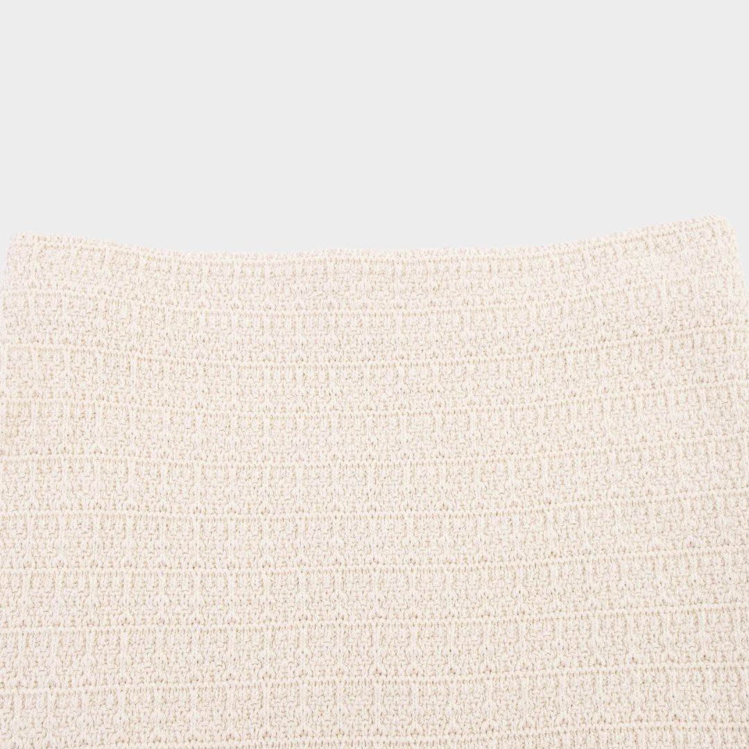 Tvådelad set med kortärmad kofta och midikjol i stickad bomullsblandning