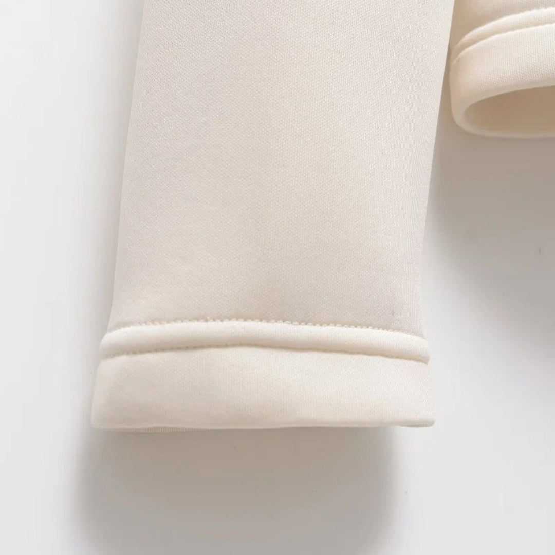 Huva sportjacka i smal passform med quiltat framstycke och mjuka stretchärmar