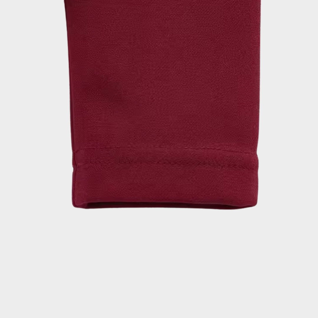 Asymmetrisk damtopp med lång ärm och kort längd