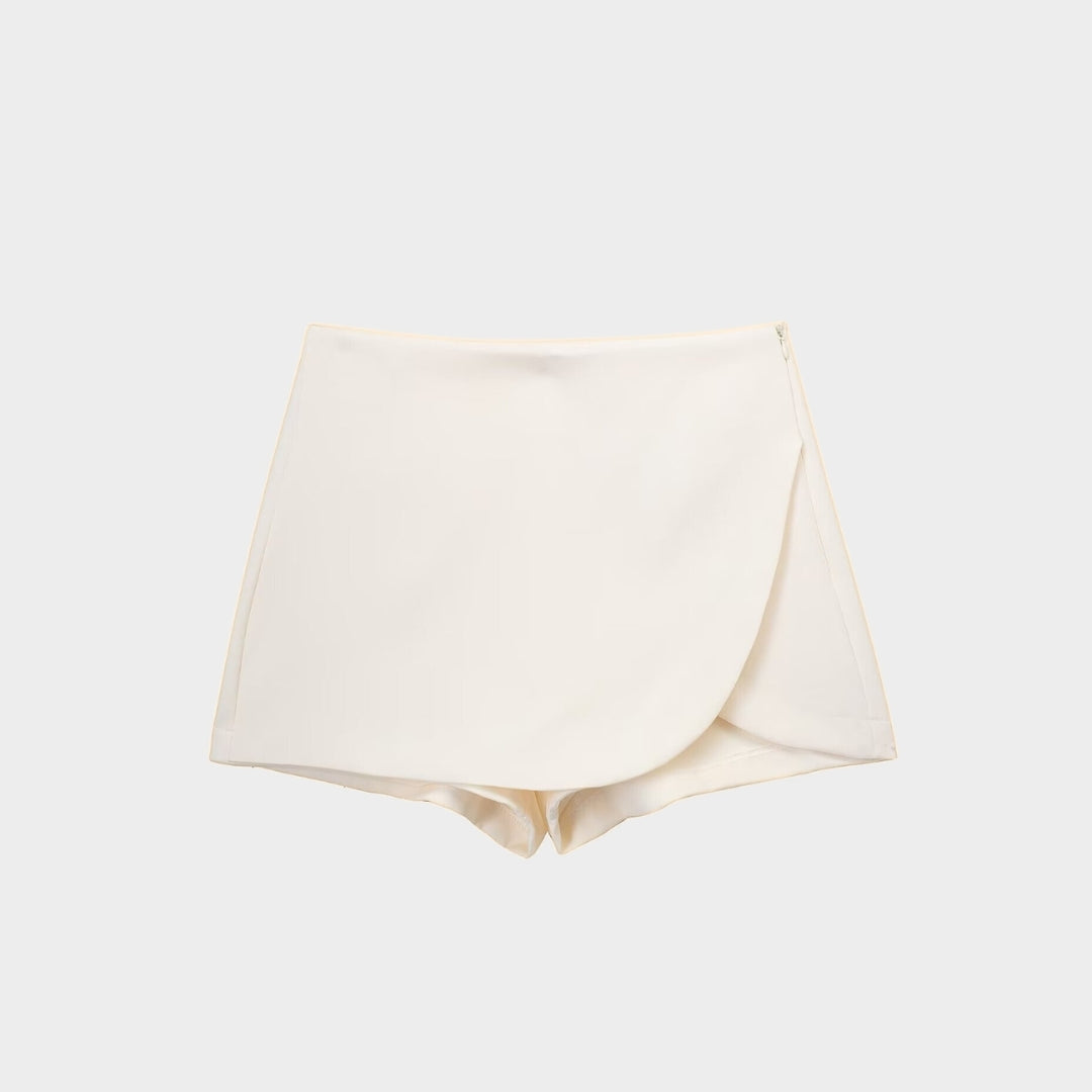 Asymmetrisk miniskort med omlott design och hög midja