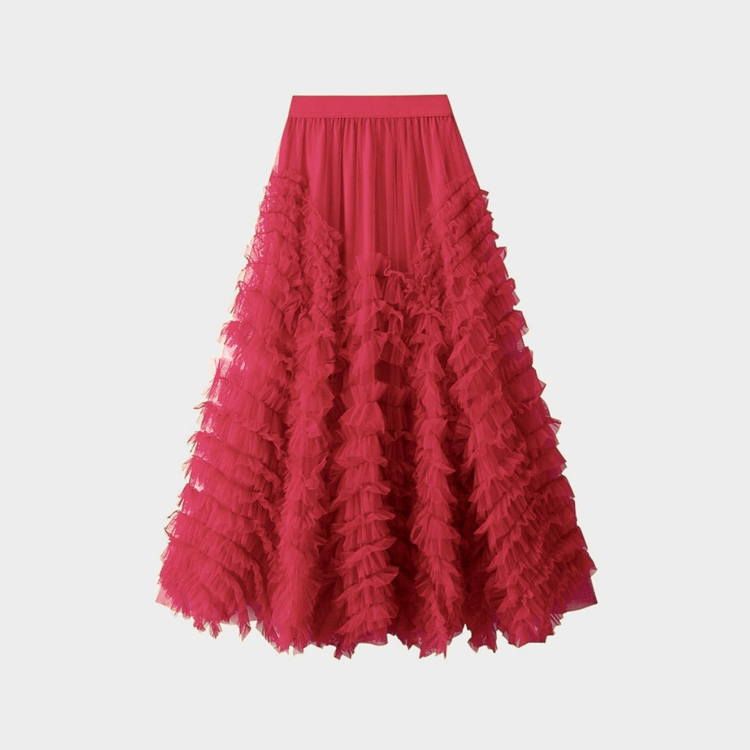 Kjol i mesh med volanger empiremidja A-linje silhuett och lagerstruktur