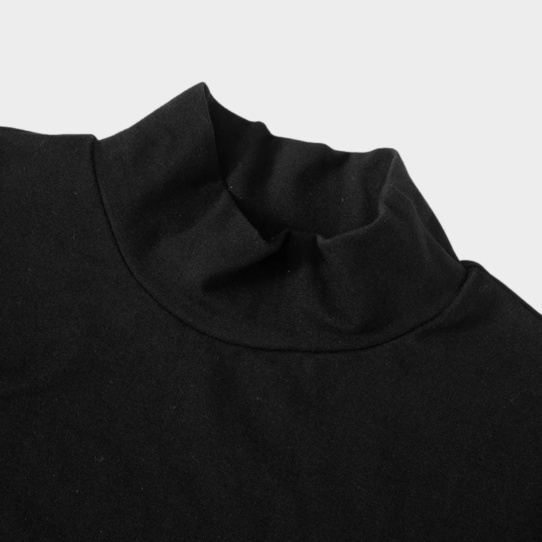 Tvåfärgad trikåklänning med polokrage och halvlånga ärmar