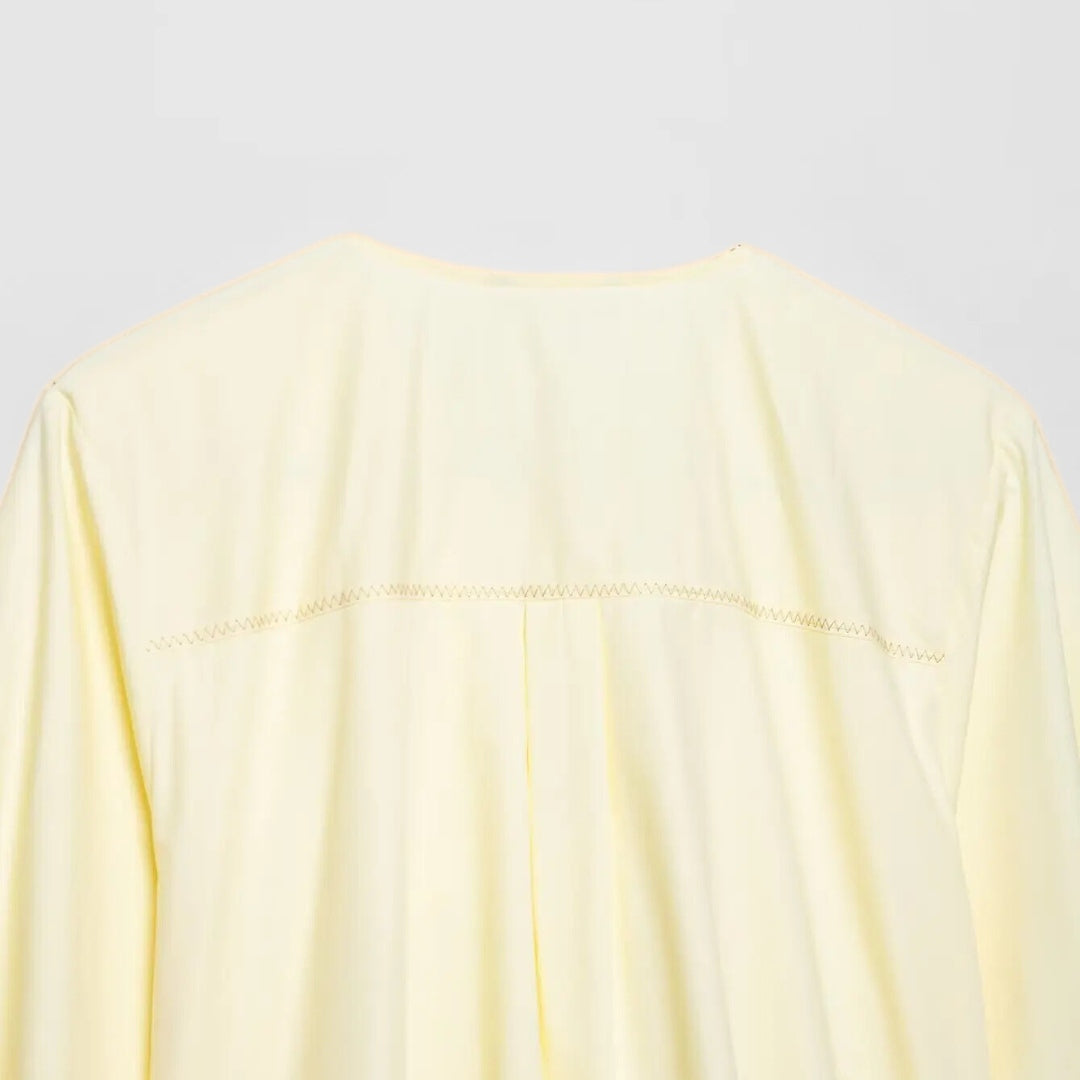 Blus i poplin med knytband och ränder