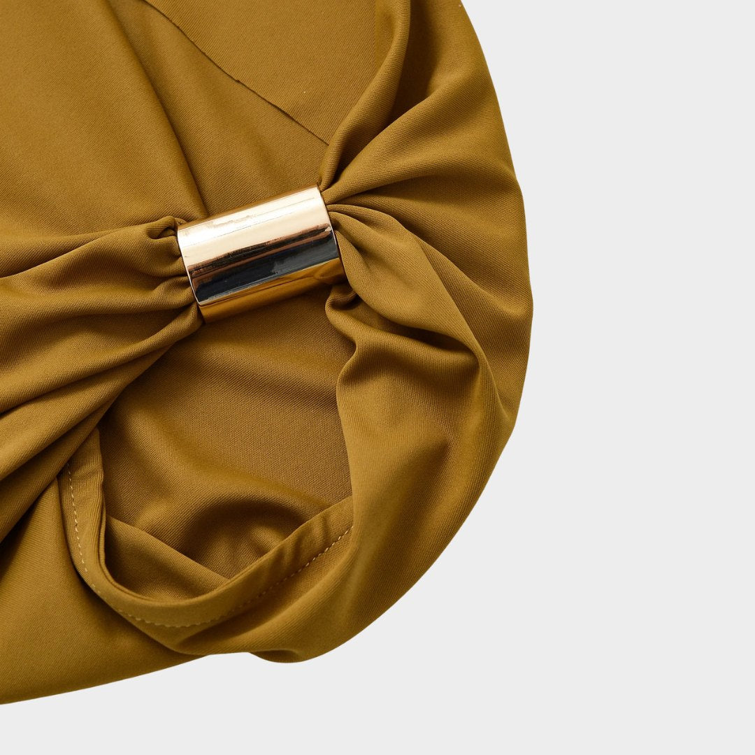 Stickad väst med ränder och asymmetrisk fåll