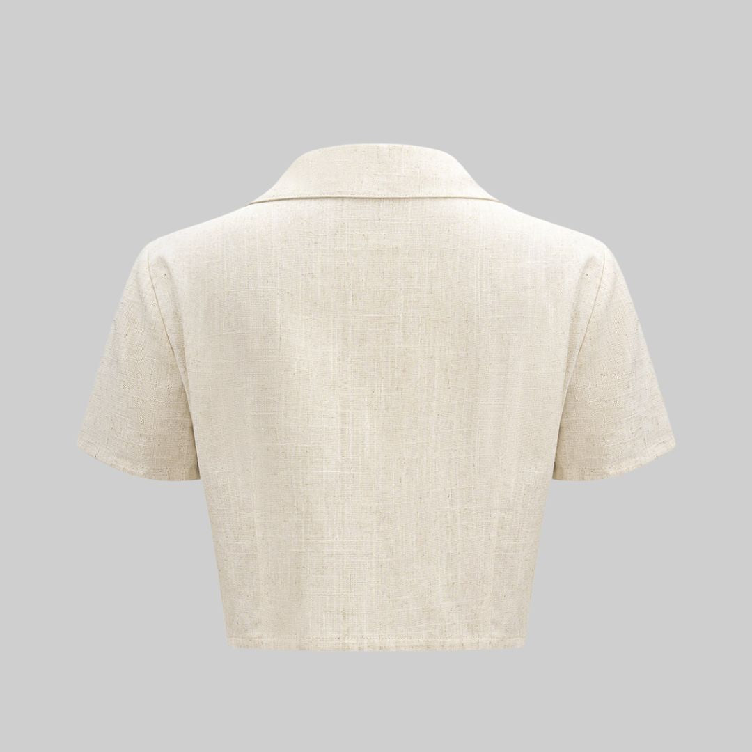 Ärmlös topp i linne- och viskosblandning med figurnära passform och strukturerad yta