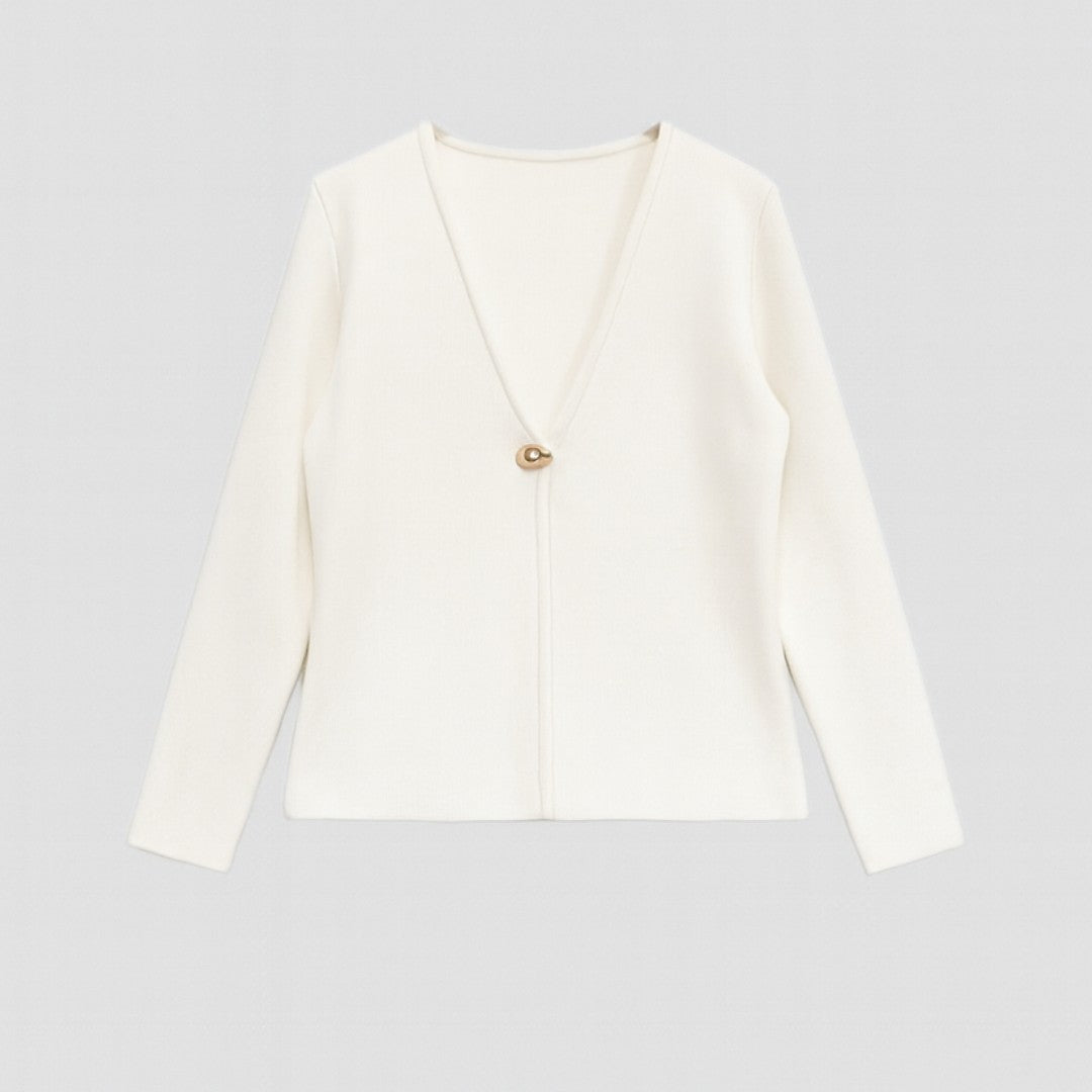Pastellfärgad stickad kofta med V-ringning och guldfärgad knapp