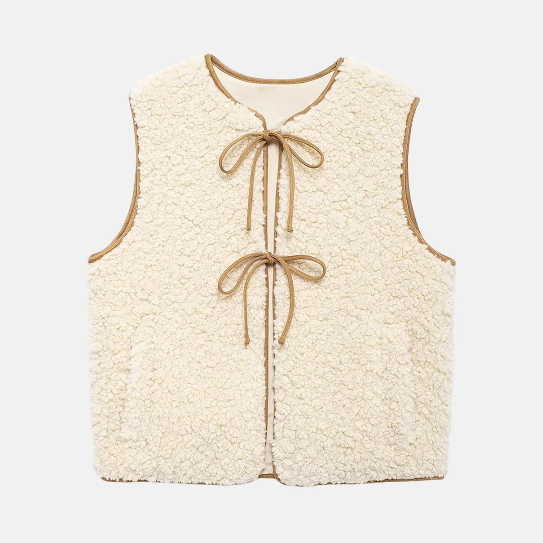 Fleeceväst med knytning och kontrastkant
