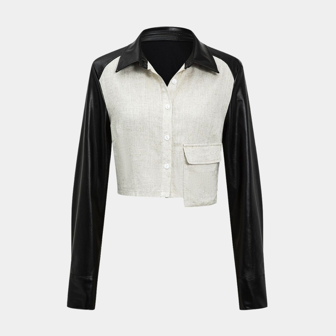 Kort figursydd skjorta i linnestruktur med kontrastärmar i veganskt läder och knappstängning