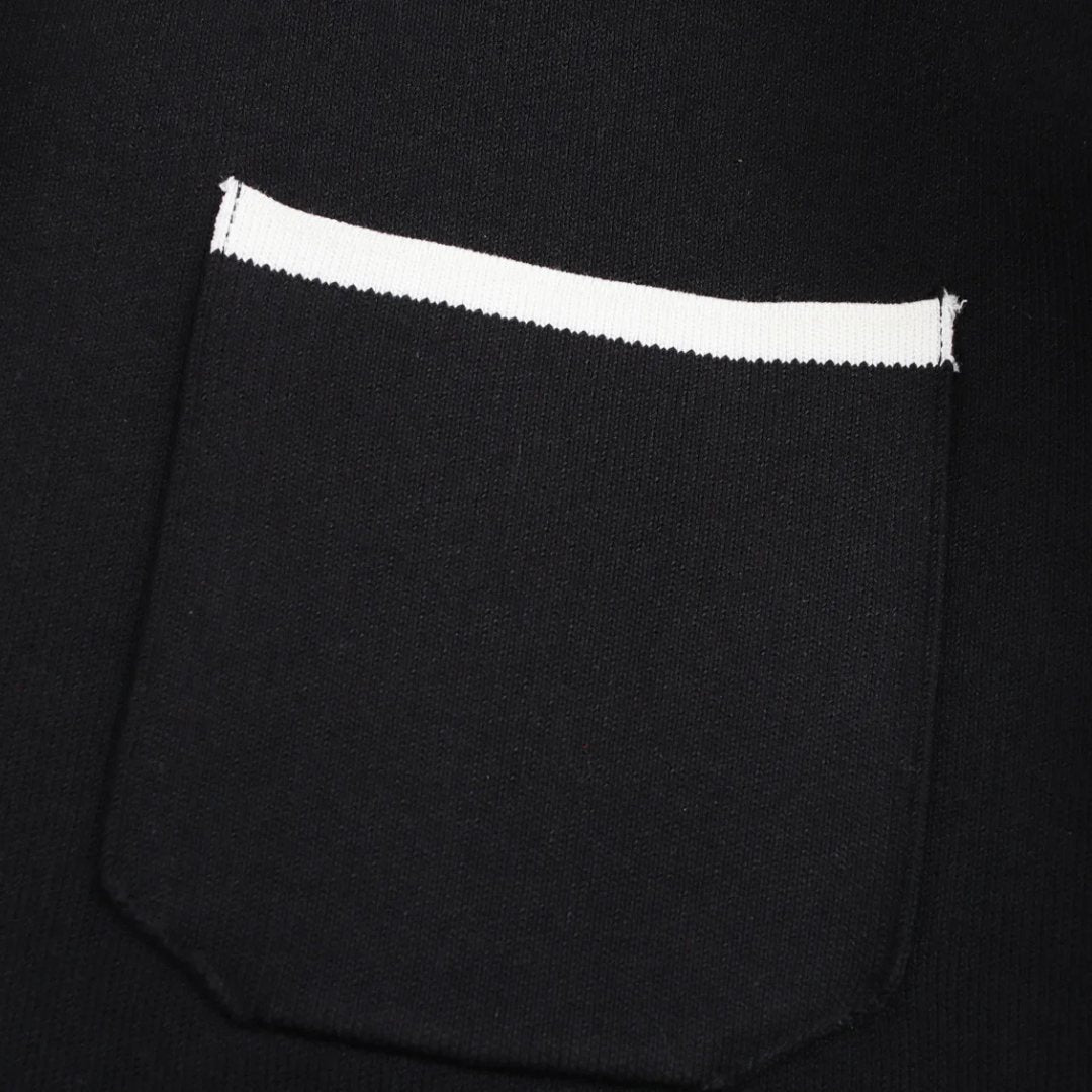 Elegant svart tvådelad stickad set med kofta och minikjol