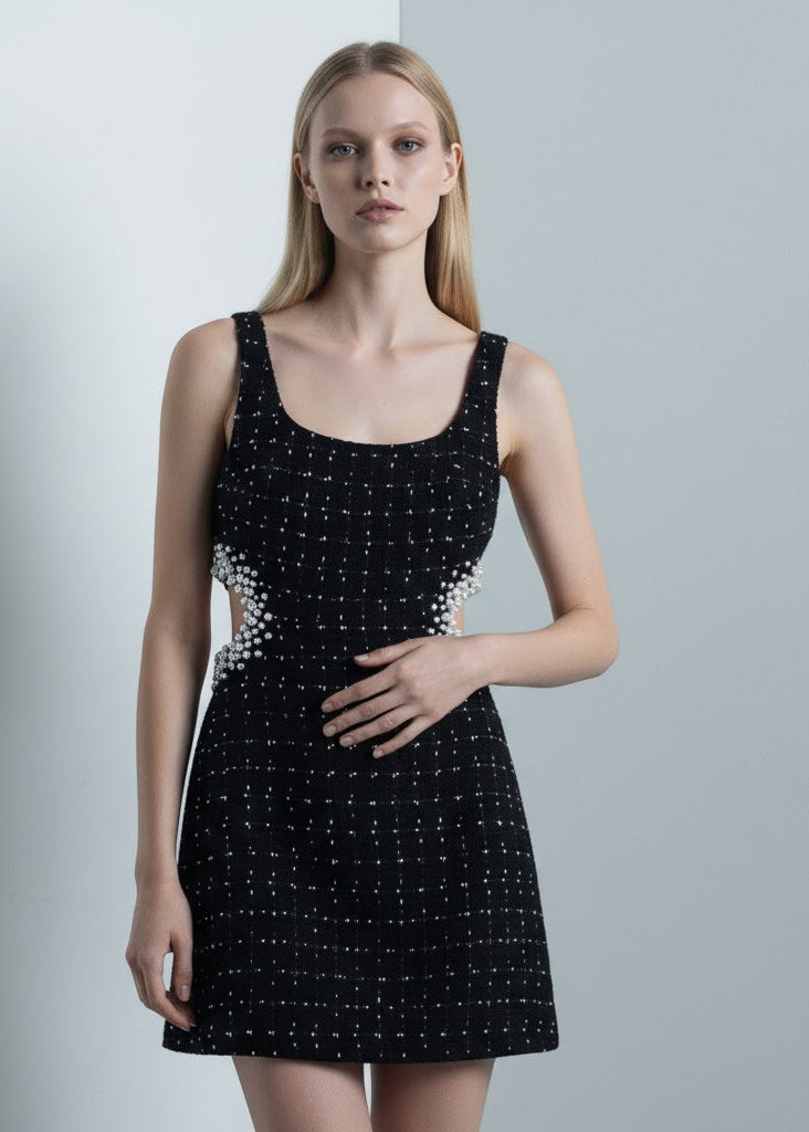 Svart ärmlös miniklänning med pärldetaljer