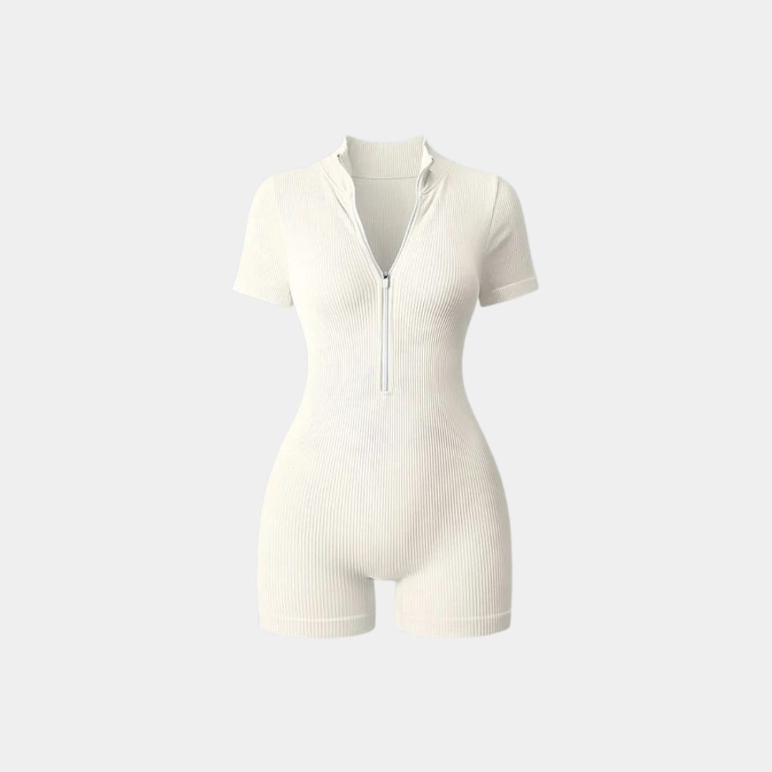 Ribbad one-piece med korta ärmar och ben samt midzip-dragkedja
