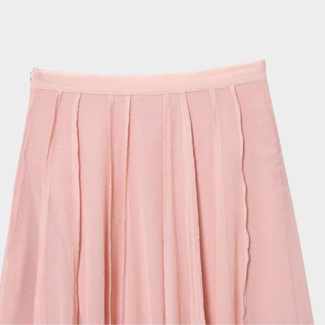 Ljusrosa Långkjol i ljusrosa med A-linjeform och svepande silhuett