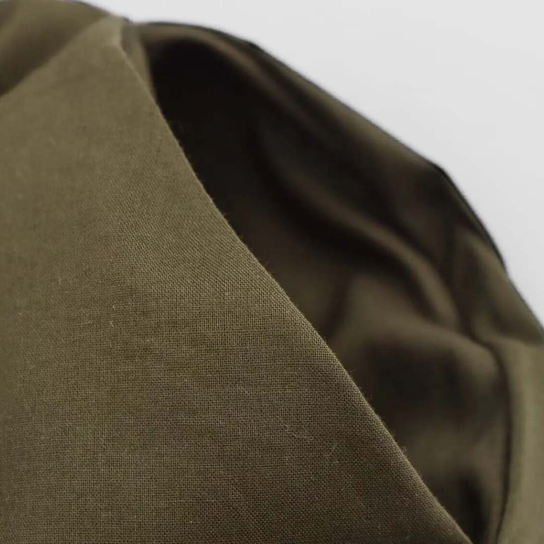 Midiklänning med omlottkänsla och resårmidja i vävt tyg