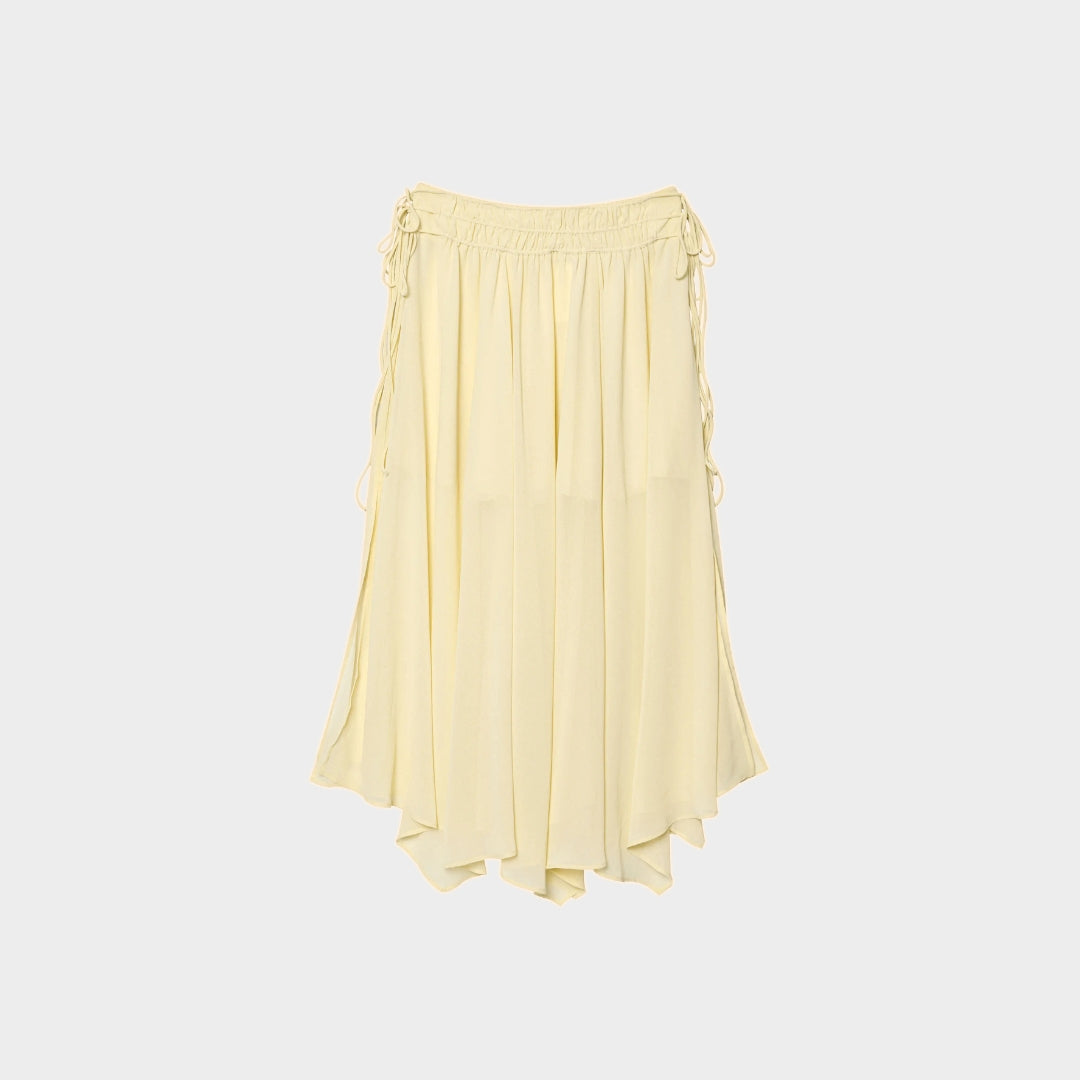 Blus med volangdetaljer och knytband samt asymmetrisk midikjol set