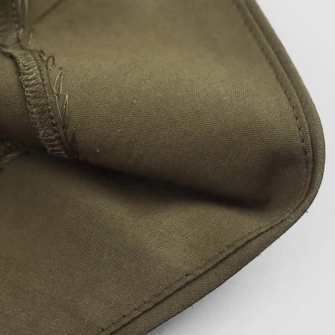 Midiklänning med omlottkänsla och resårmidja i vävt tyg