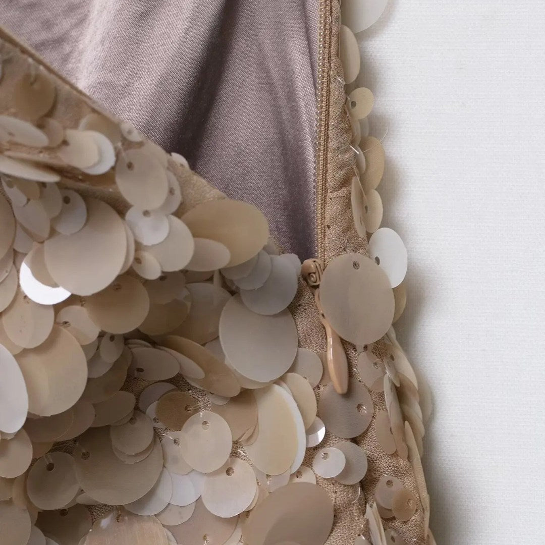 Paljett minikjol med A-linje silhuett och festlig design