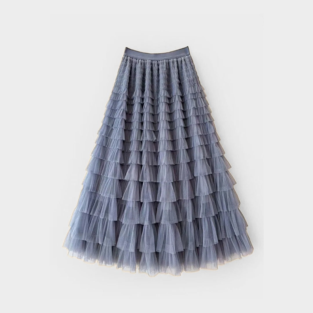 Kjol i mesh med plisserade lager naturlig midja och avslappnad passform