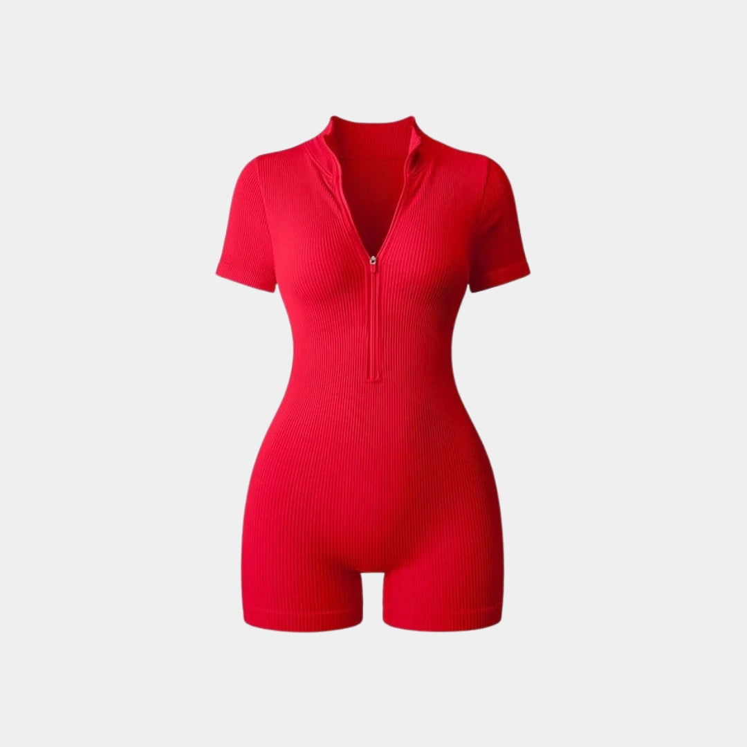 Ribbad one-piece med korta ärmar och ben samt midzip-dragkedja