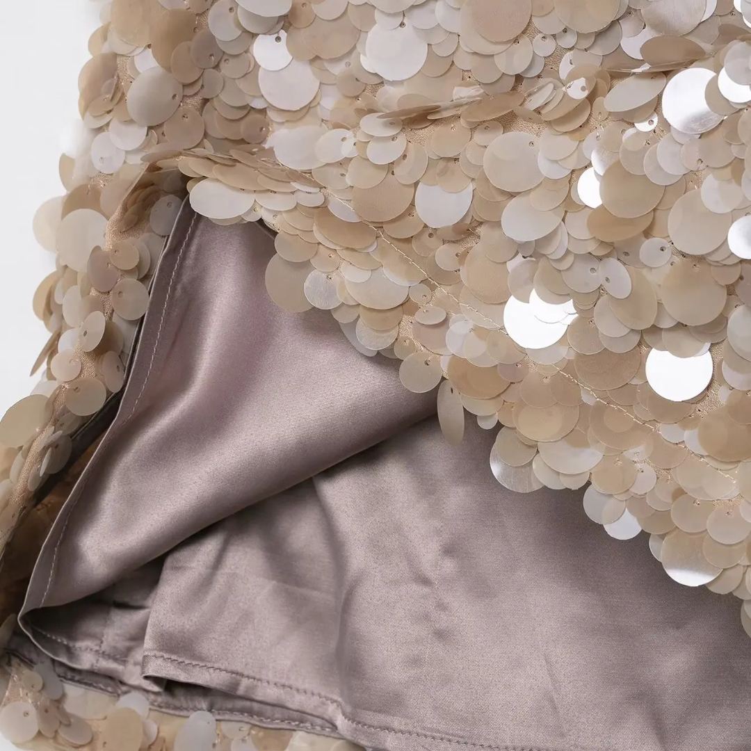 Paljett minikjol med A-linje silhuett och festlig design