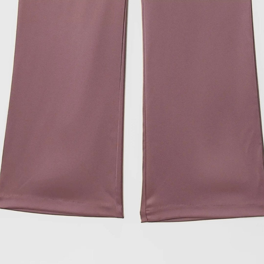 Tvådelat set med asymmetrisk topp och vida byxor – enfärgat eller prickigt