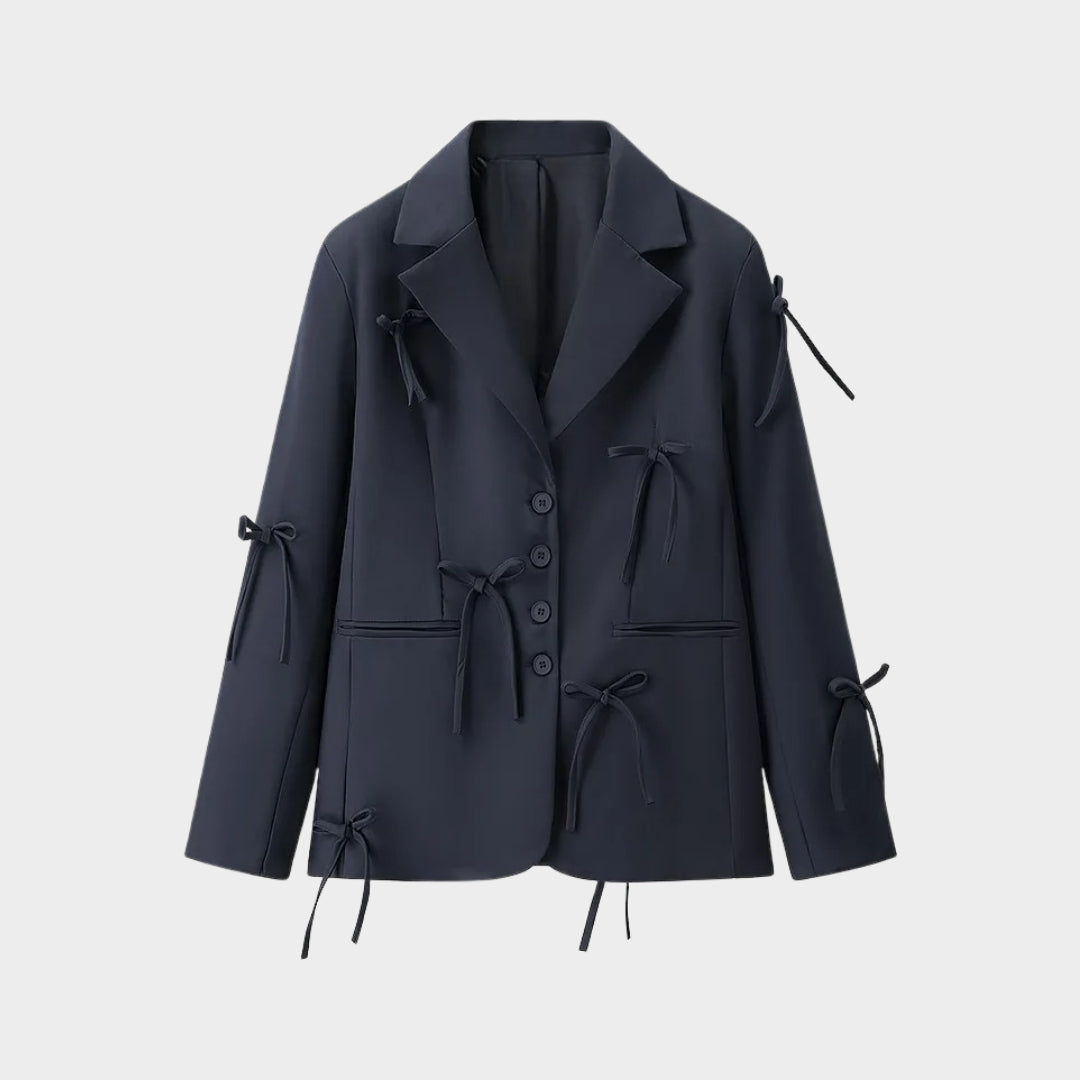 Enkelknäppt kavaj med slagkrage och dekorativa rosetter