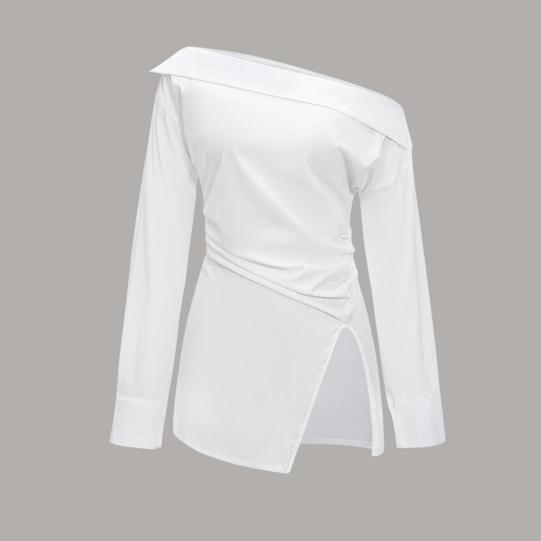 Asymmetrisk topp med bar axel och markerad midja stilren design med skulptural silhuett