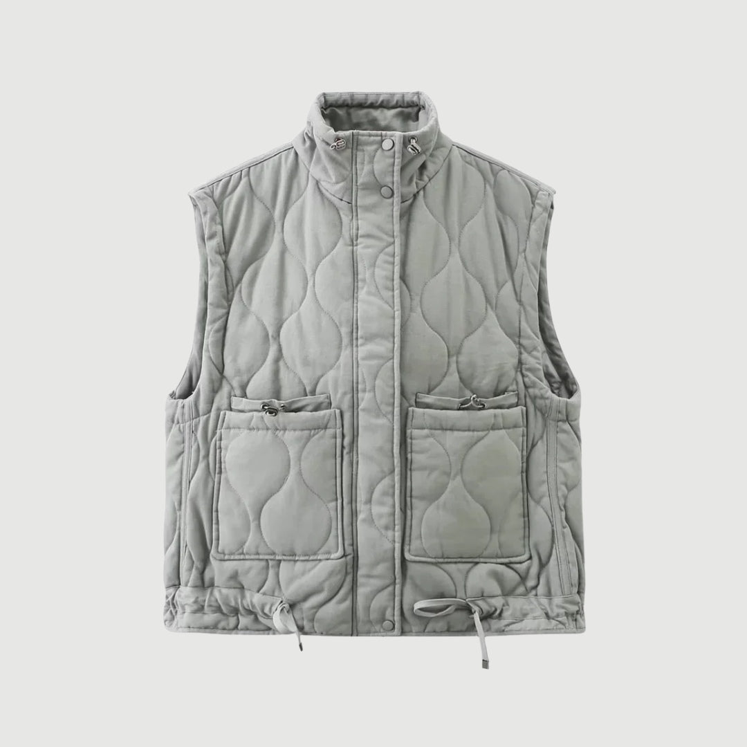 Vadderad väst i medellängd med ståkrage och tvättad workwear-look
