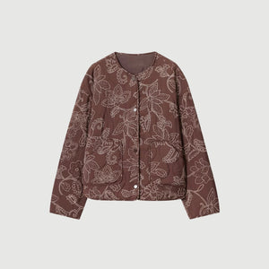 Kort blommönstrad vadderad jacka med broderi och rund hals