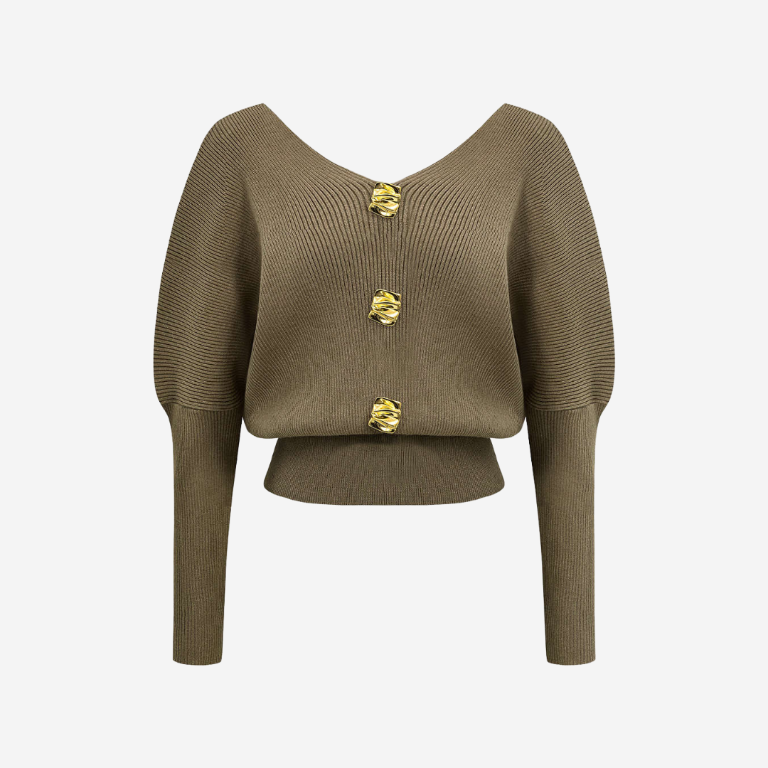 Stickad topp med dekorativa knappar och djup urringning för elegant vardagsstil