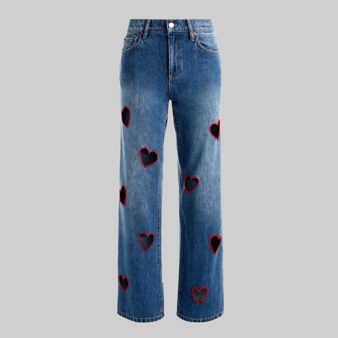 Blå Denimjeans med Hjärtformade Utskärningar och Kontrasterande Röd Kant