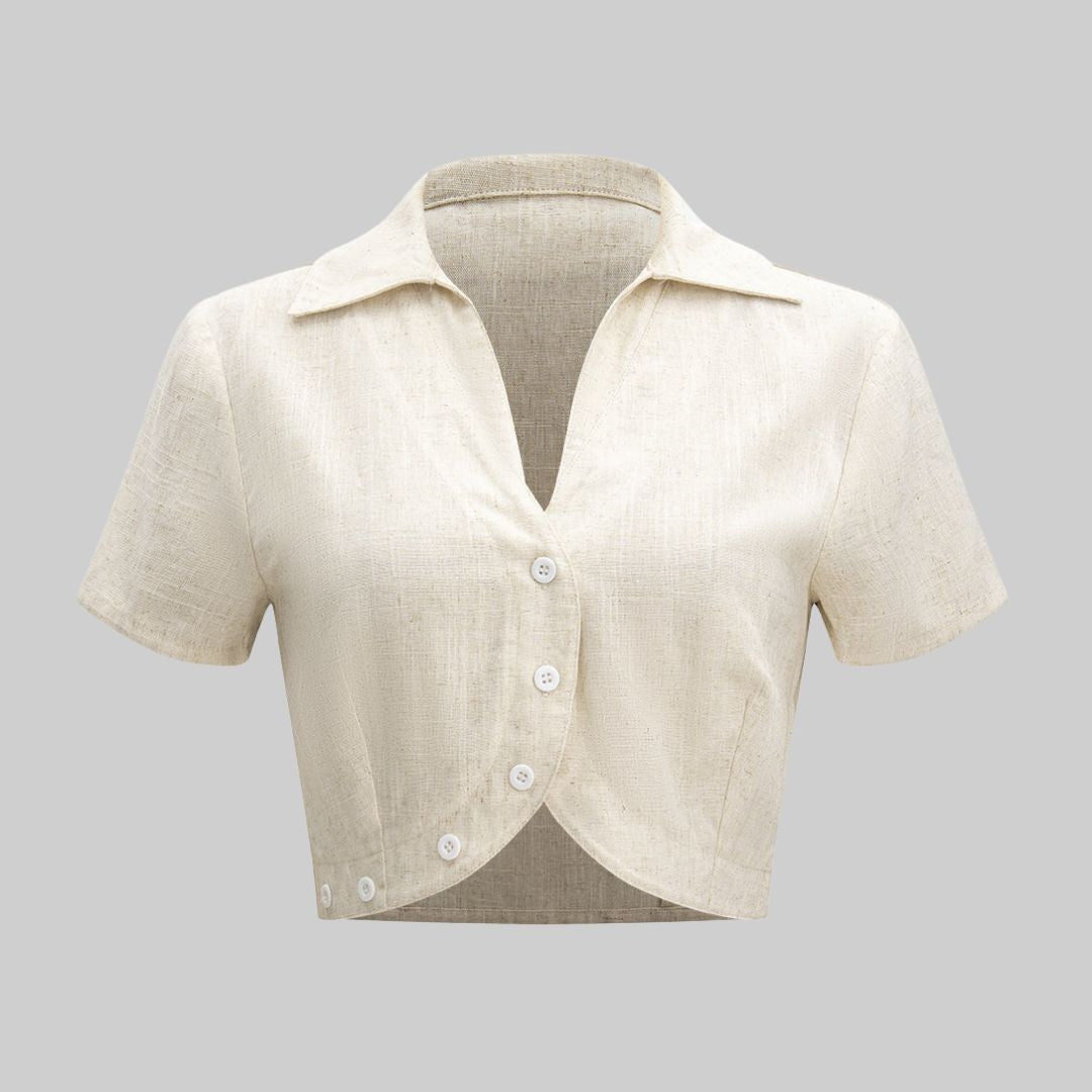 Ärmlös topp i linne- och viskosblandning med figurnära passform och strukturerad yta