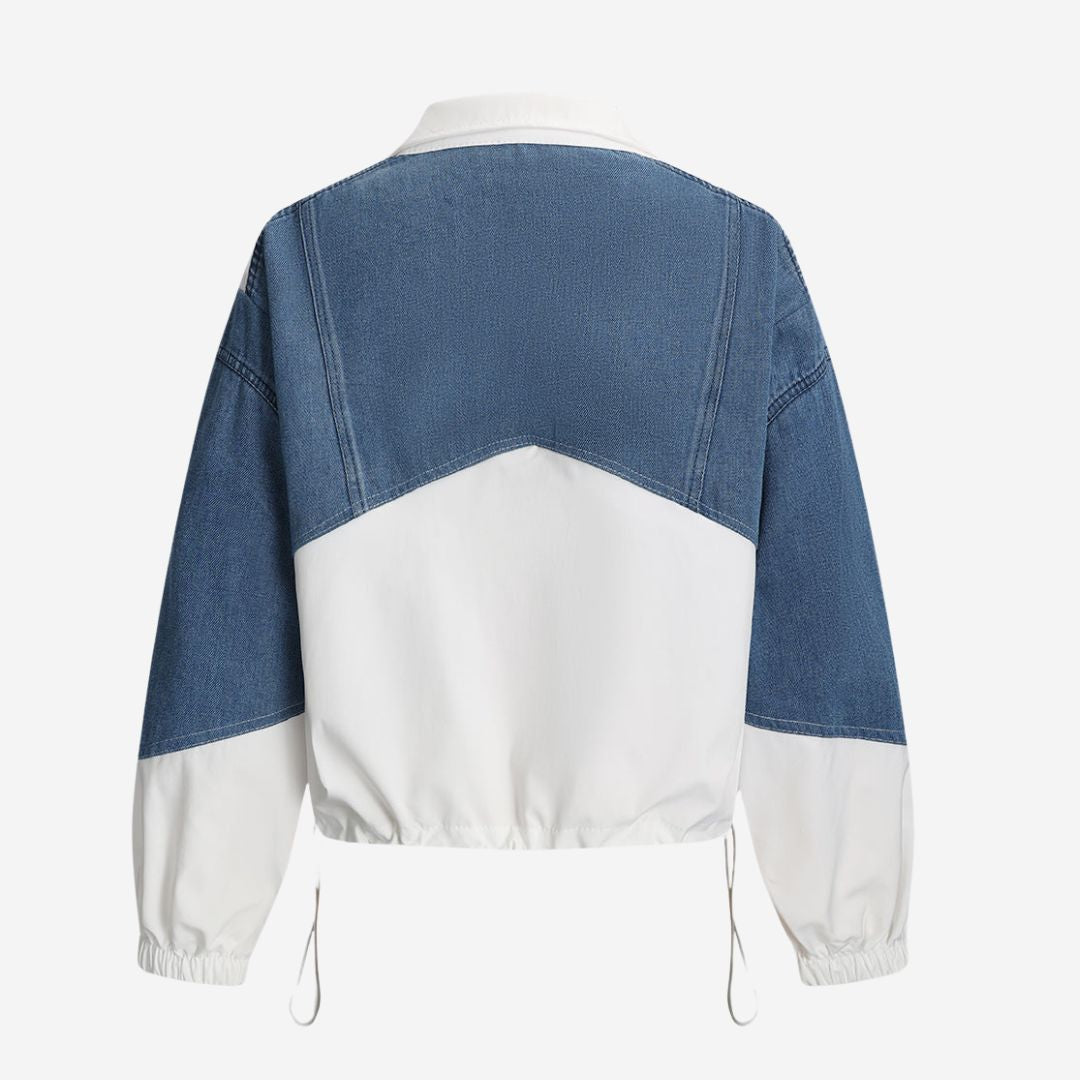 Vit sportjacka med denimöverdel i tvådelad design och dragkedja