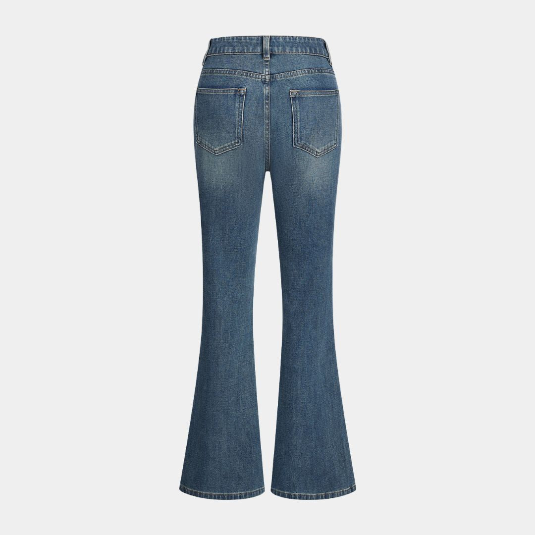 Mörkblå utsvängda jeans med vintage tvätteffekt, låg stretch och figurnära passform i mjuk bomullsdenim