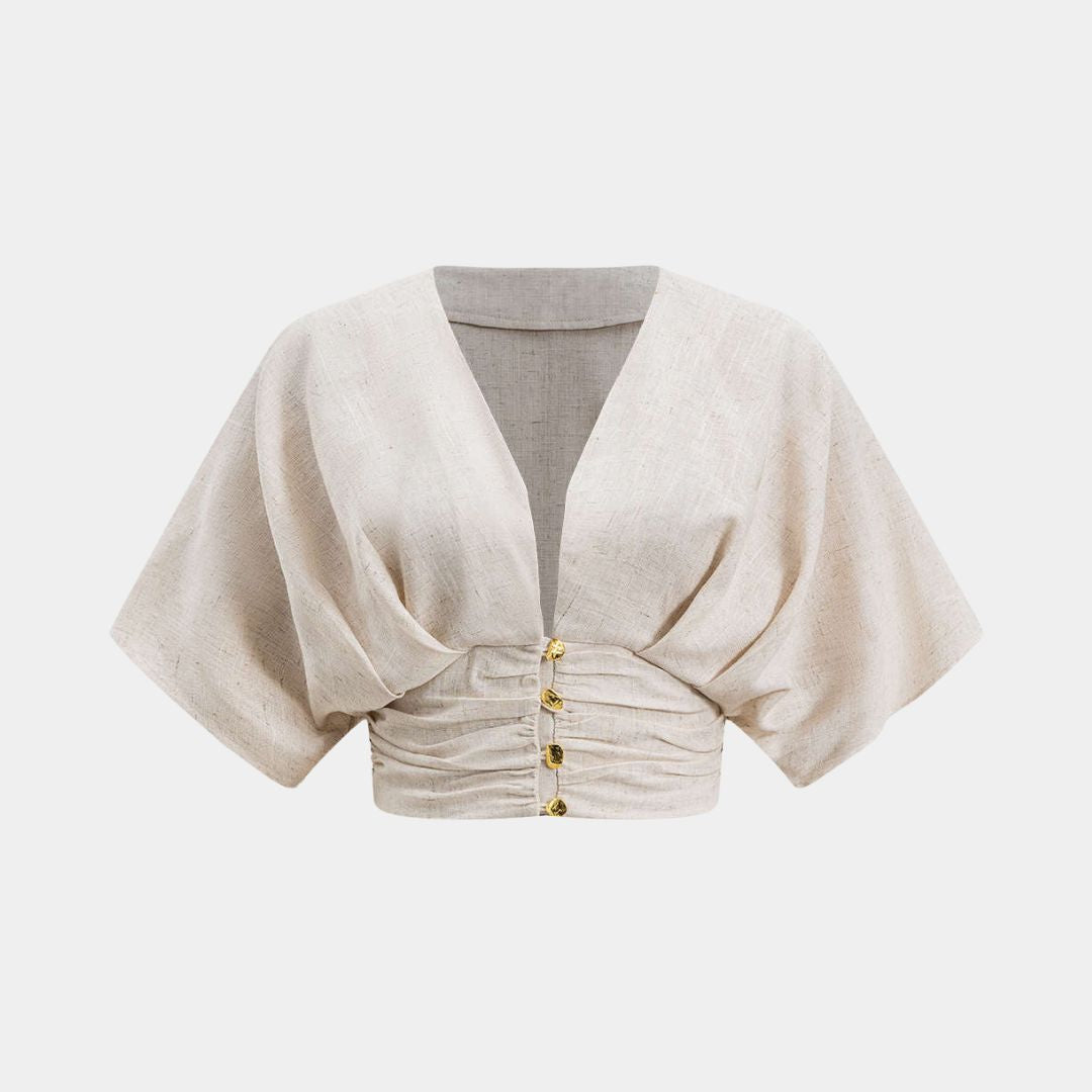 Kortärmad topp i linne med avslappnad passform och lätt struktur