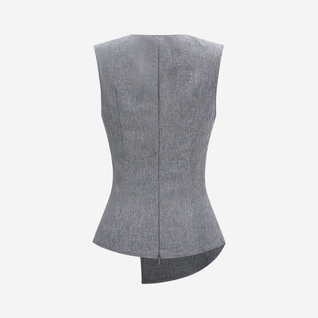 Ljusgrå ärmlös omlottopp i vävt tyg med draperad midja och asymmetrisk fåll