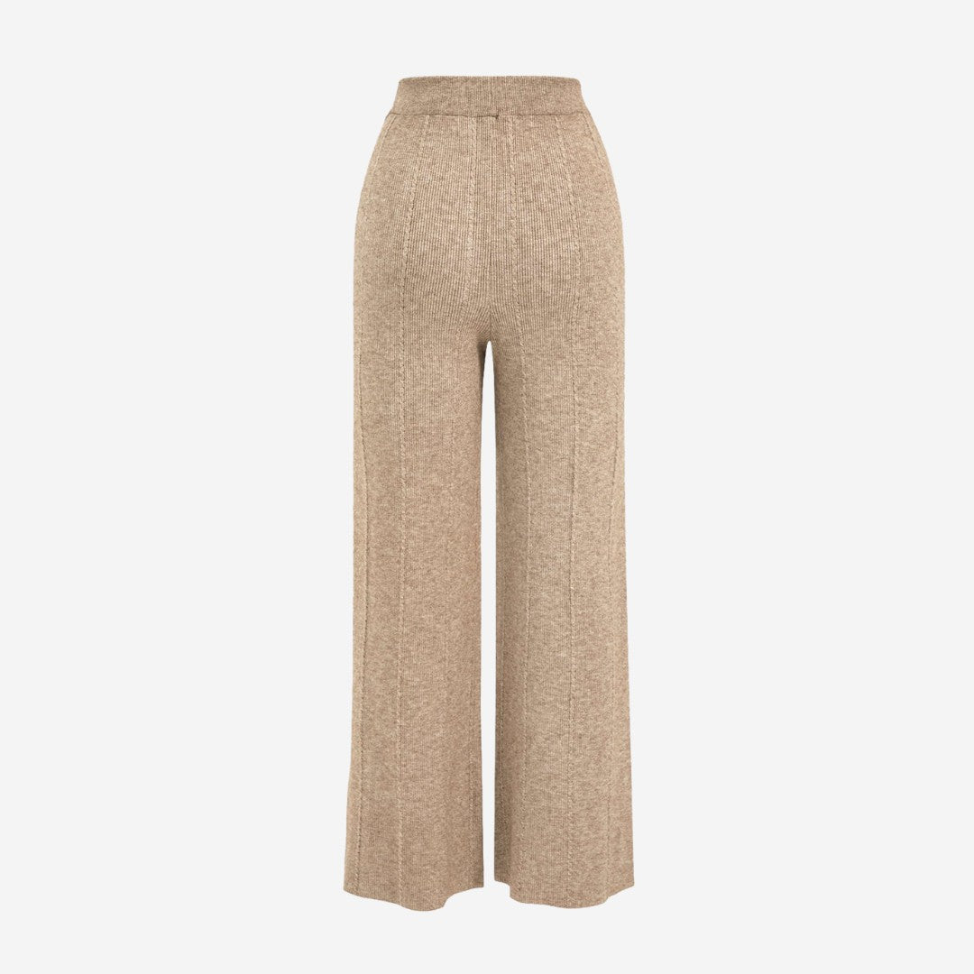 Beige stickade byxor i ribbad trikå med dragsko och hög stretch