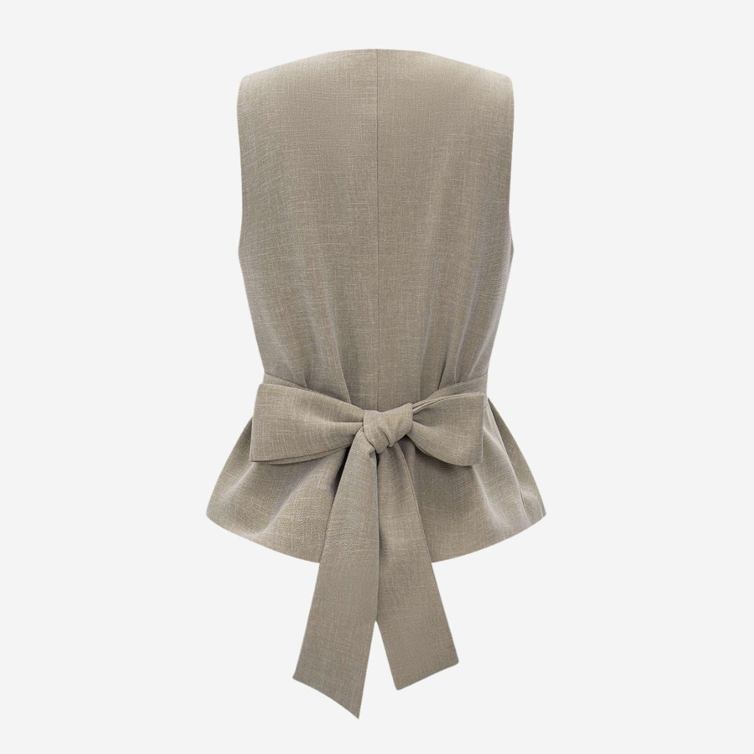 Skräddarsydd väst i elegant tweed med dekorativa knappar och markerad midja med knytband