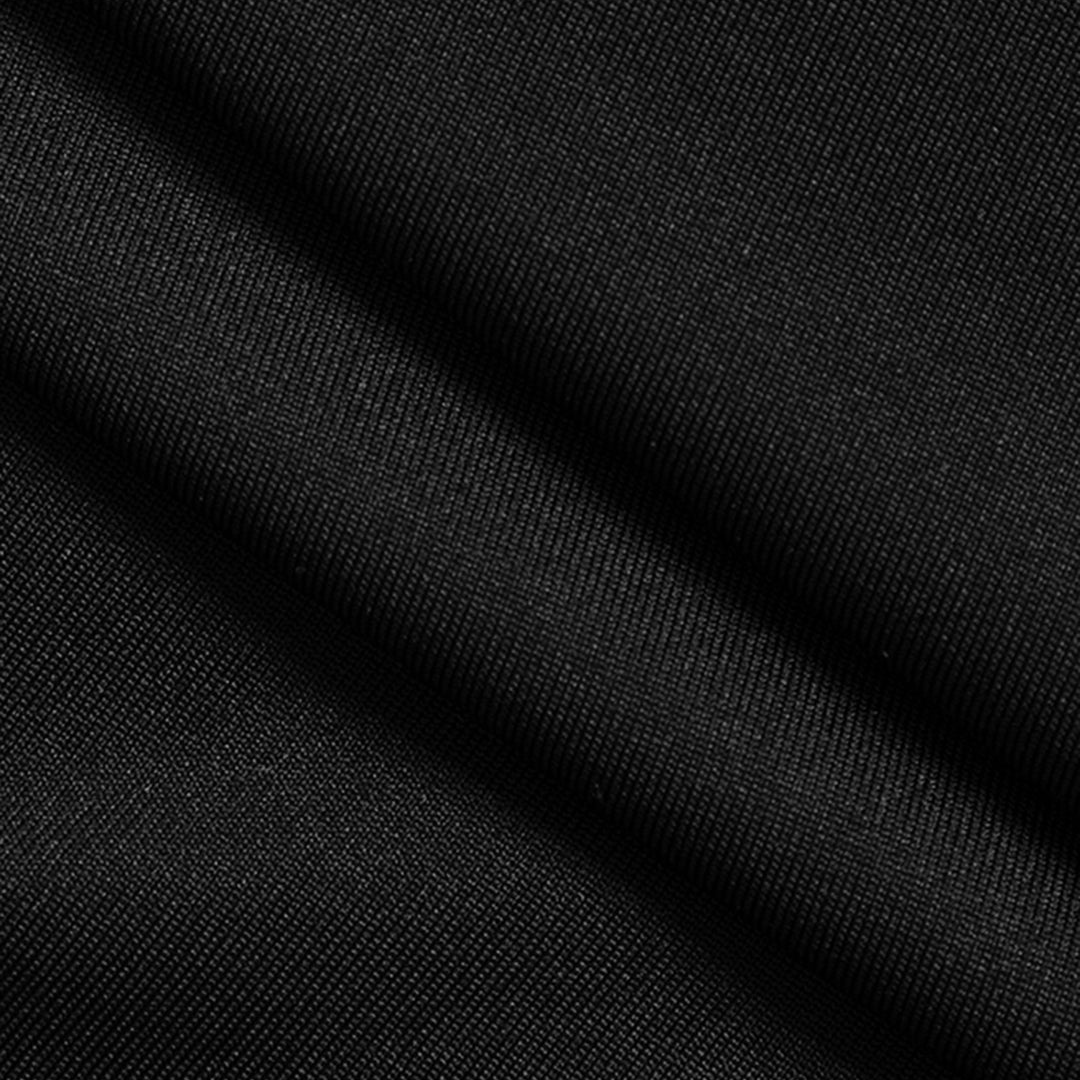 Lång svart aftonklänning i stretchjersey med transparent midjepanel i mesh och figurnära silhuett