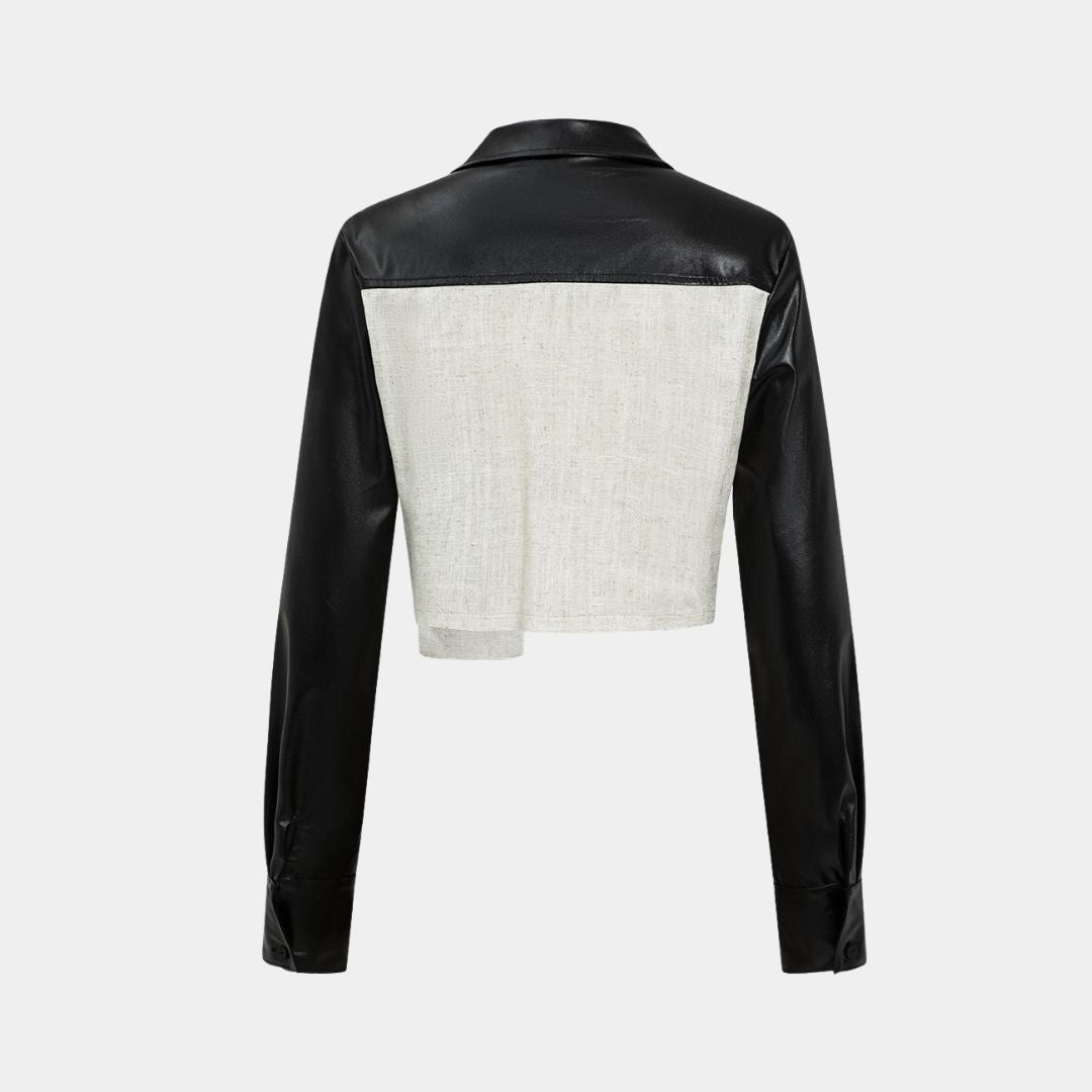 Kort figursydd skjorta i linnestruktur med kontrastärmar i veganskt läder och knappstängning