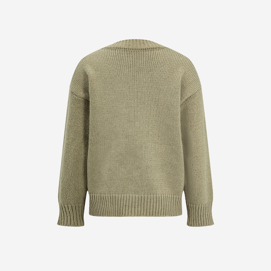 Grön stickad kofta med toggle-knappar och ribbade ärmslut