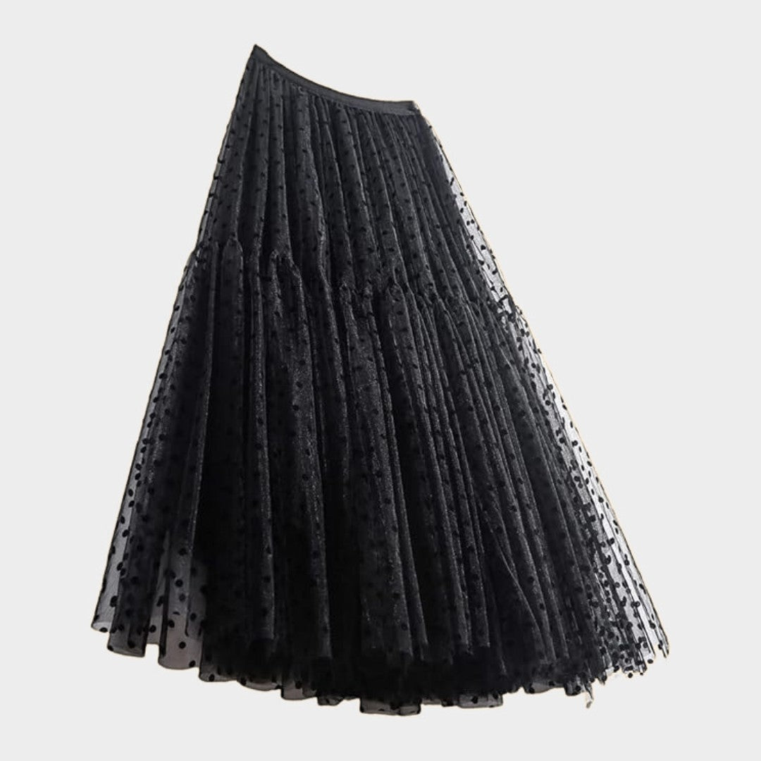 Kjol i tyll med prickmönster empiremidja A-linje silhuett och ankellängd