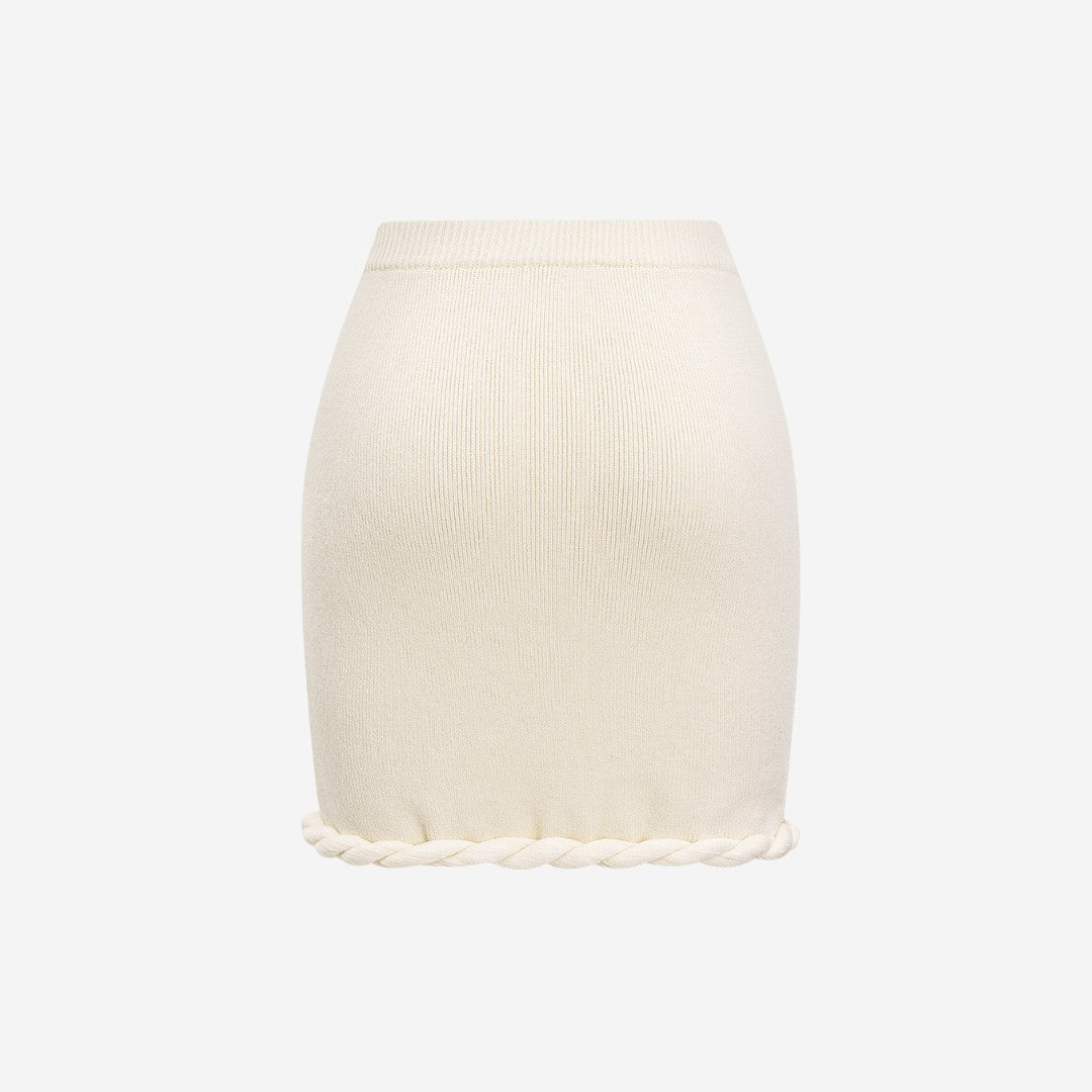 Kroppsnära stickad minikjol med tvinnad dekorativ kant och låg stretch