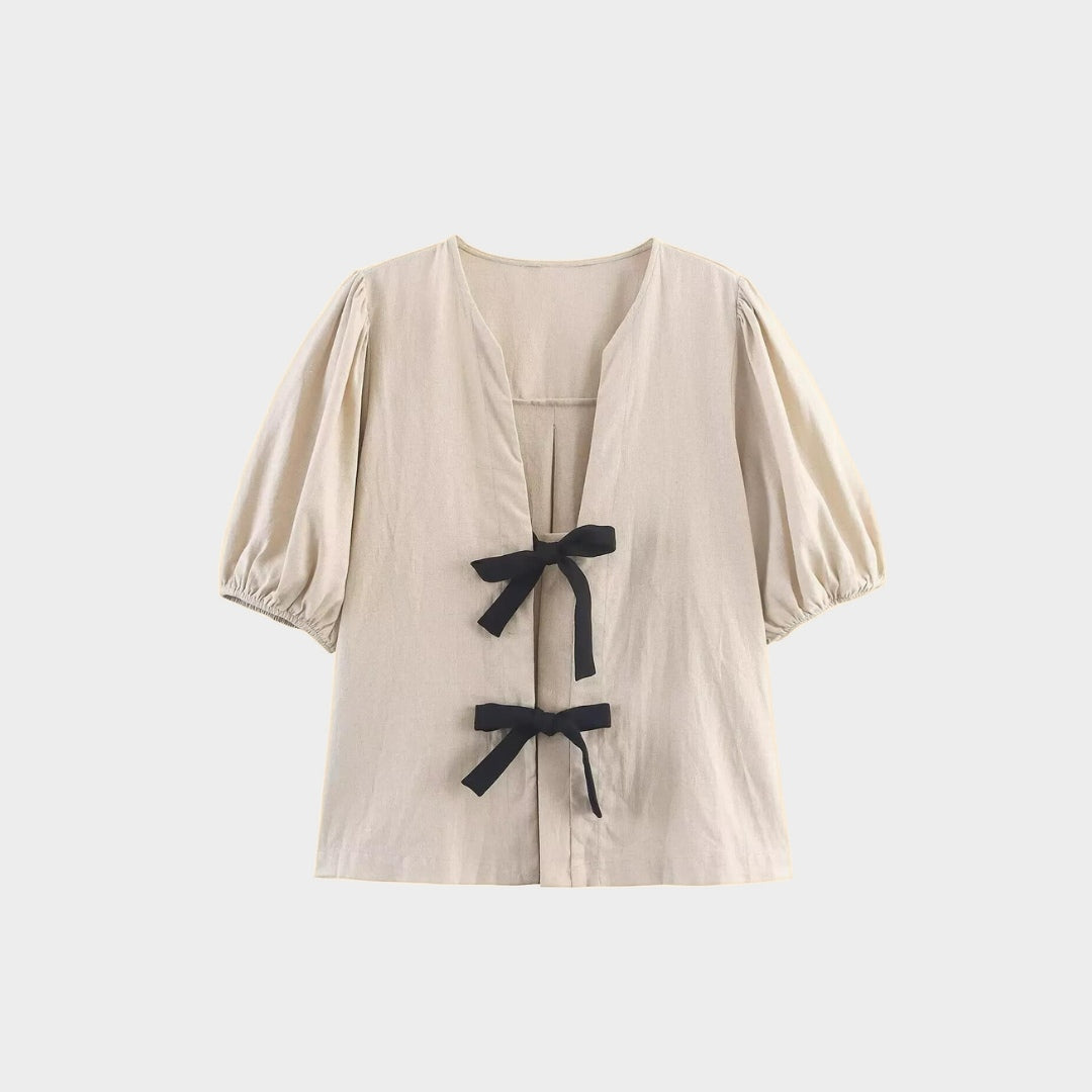 Blus med puffärm och knytband framtill i vävt tyg