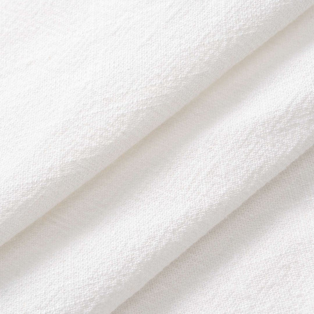 Tvåfärgad kortärmad skjortblus i denim och linne med knytning och fickdetaljer