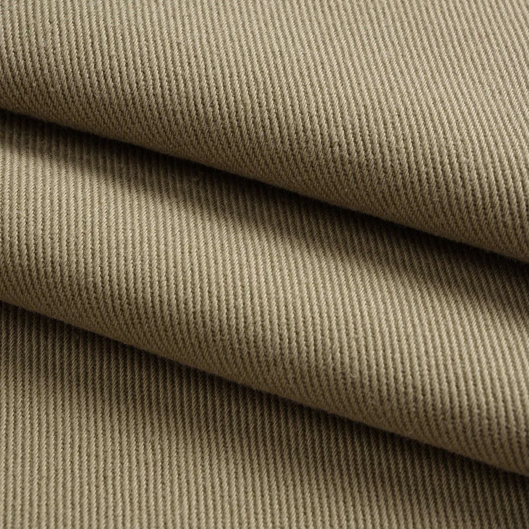 Khakifärgade vida workwear-jeans med markerade sömmar, raka ben, bakfickor och strukturerad denim utan stretch