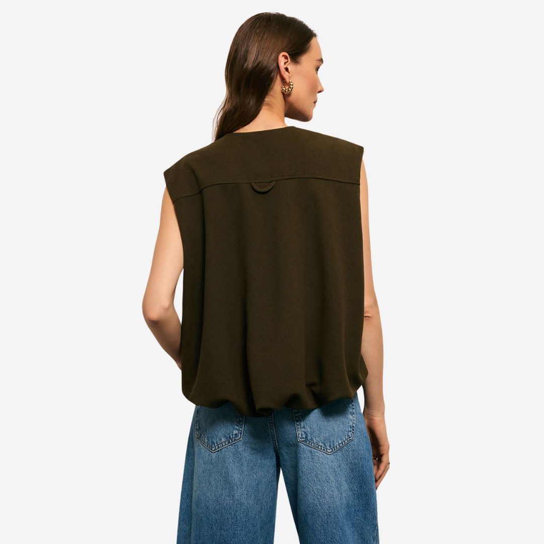 Mörkgrön ärmlös jackväst i strukturerat tyg med dragkedja och ficklock för dam